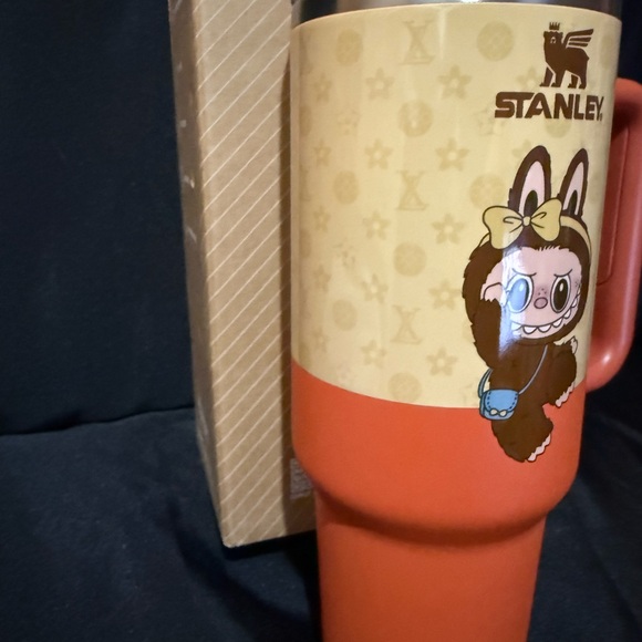New Stanley 40oz Orange and Cream Travel Mug with Adorable Monster Character - Picture 3 of 7